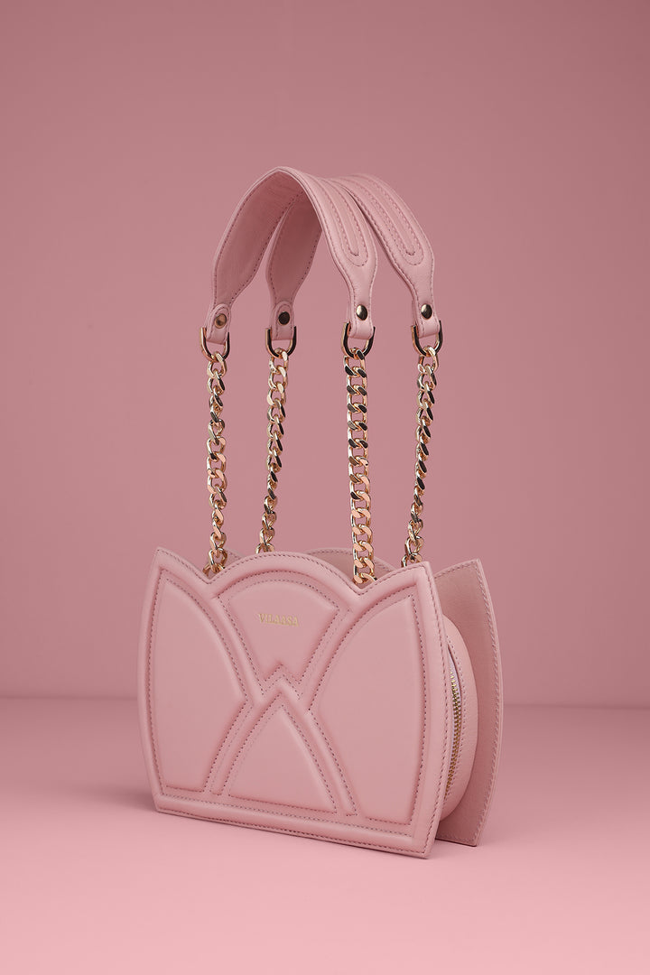 Pink shoulder handbag with chain strap